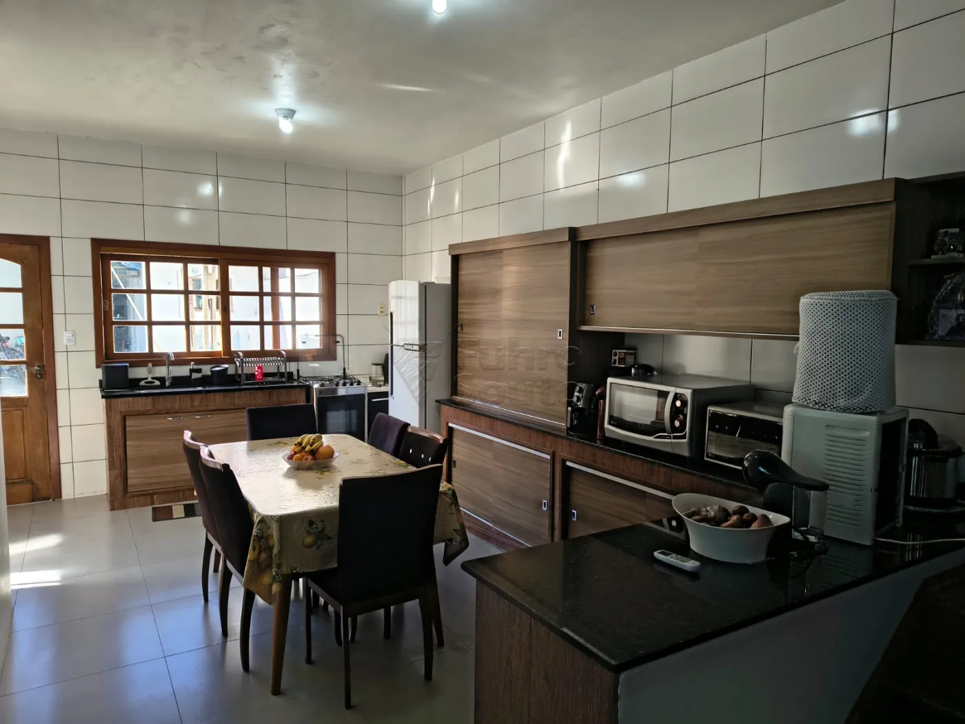 Comprar Casa / Padr&atilde;o em Pelotas R$ 450.000,00 - Foto 4