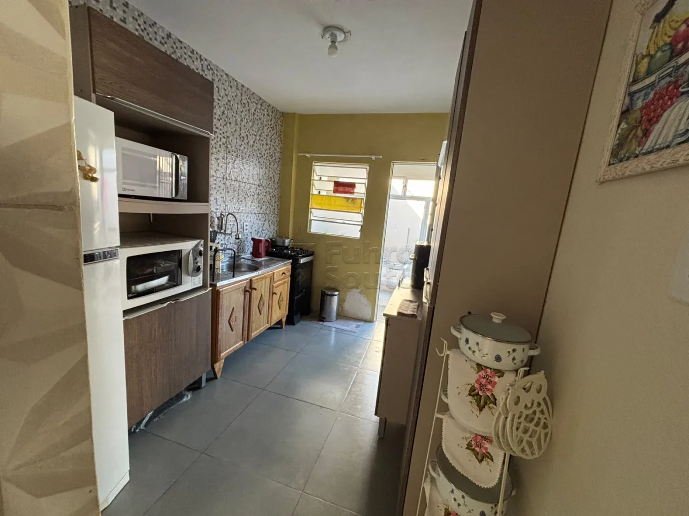 Comprar Casa / Padr&atilde;o em Pelotas R$ 450.000,00 - Foto 6