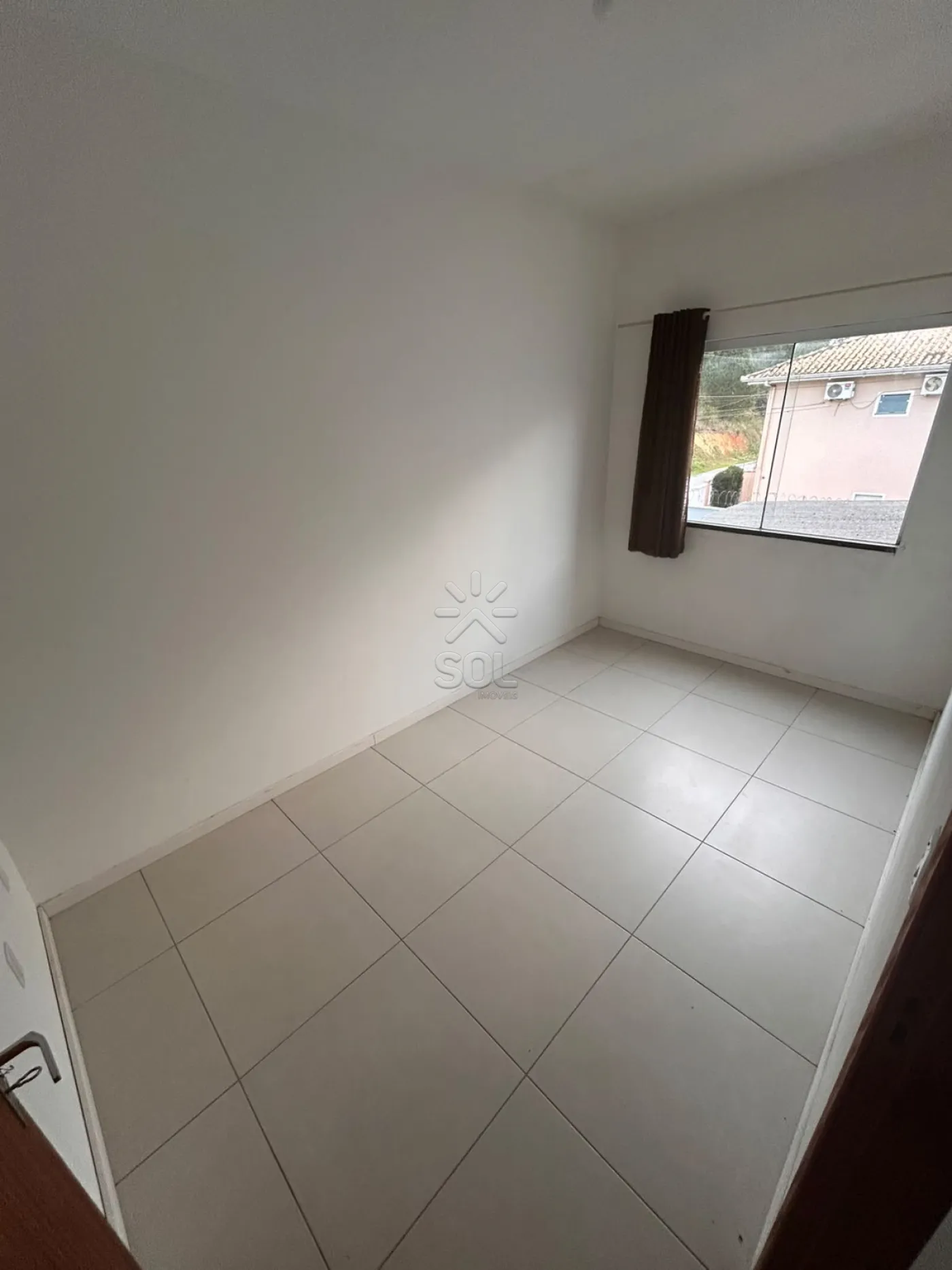 Sobrado para locação em condomínio fechado no bairro Itacolomi, Balneário Piçarras/SC - 82,75m² | 2 quartos