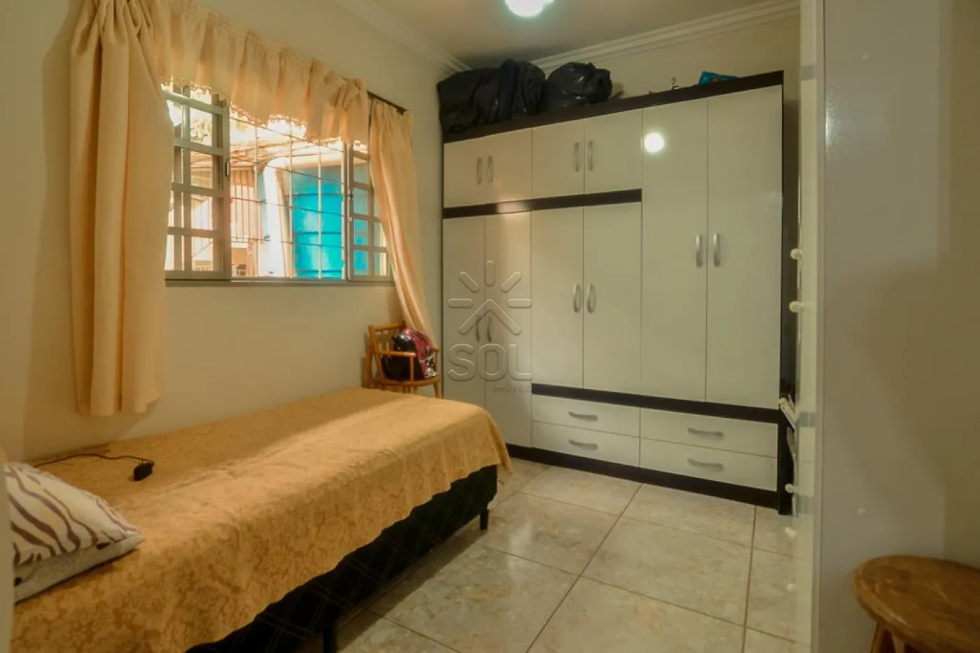 Casa com sobrado à venda no Jardim São Paulo em Foz do Iguaçu/PR - 180m² construídos em terreno de 371,84m²