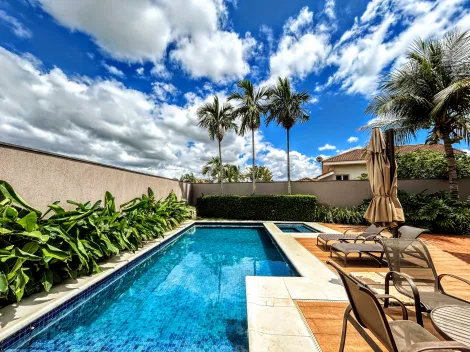 Casa sobrado de 410m² com 05 suítes à venda em condomínio - Santa Mônica