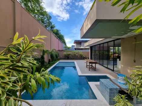 Casa sobrado de 450m² com 04 suítes à venda em condomínio - Jardim Olhos D`água