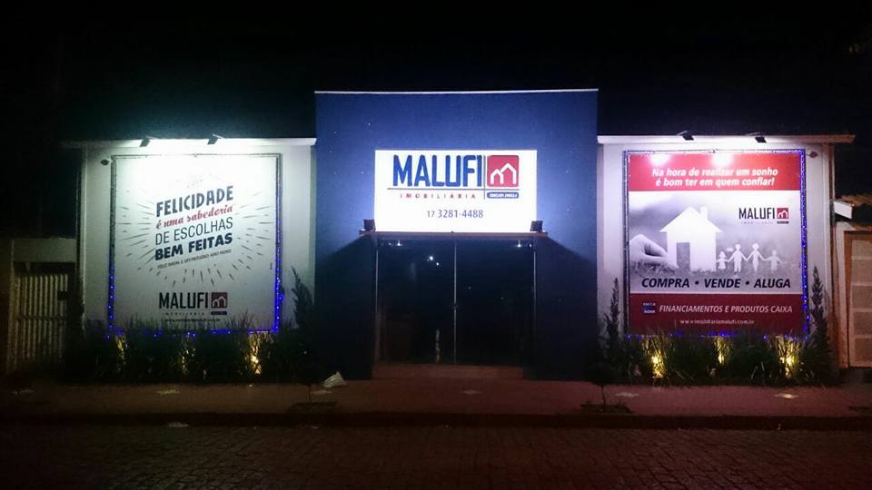 Imobili�ria Malufi em Olimpia - Fachada a noite