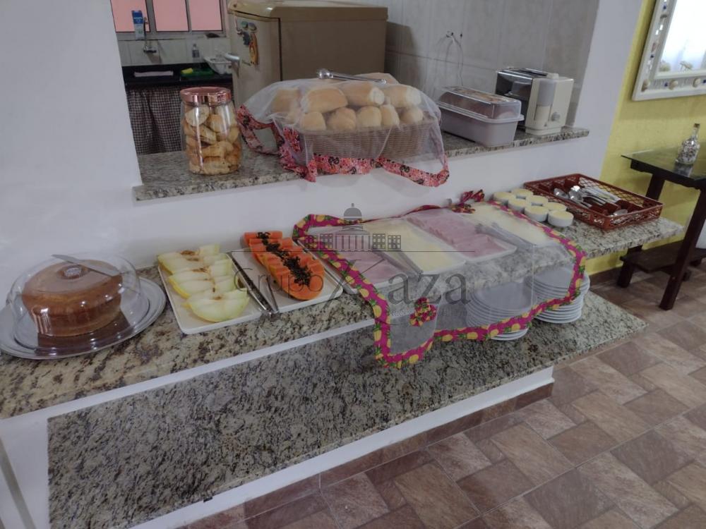 Foto 11 de Casa Sobrado em Massaguaçu, Caraguatatuba - imagem 11